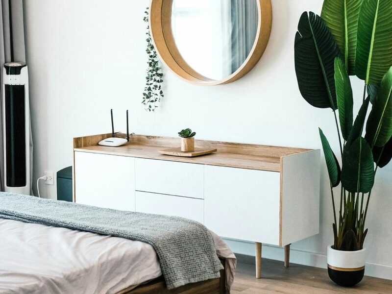 A bedroom sideboard, mirror and plant listed on FlashSales
